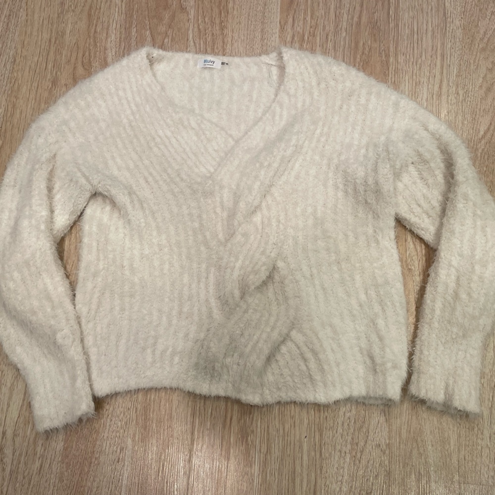 Cream sweater with interesting knit detail
